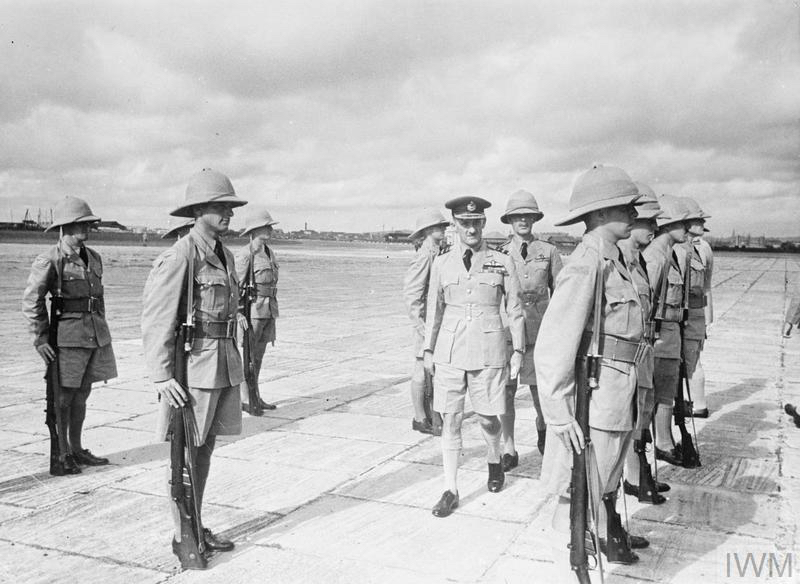 Air Vice Marshal C. V. H. Pulford, Air Officer Commanding RAF Far East, inspects trainees of the Malayan Volunteer Air Force at Sembawang, Singapore. (© IWM CF 1269)