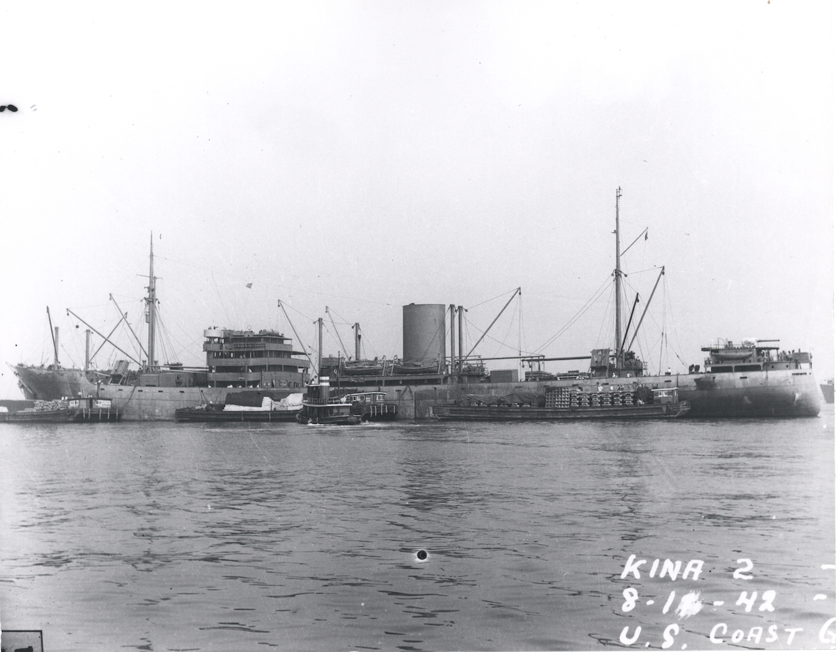 <em>MS Kina II</em> in August 1942, possibly in New York, where the vessel arrived on 24 July 1942 and left 16 August 1942. An anti-aircraft gun position is seen near the bridge. (Maritime Museum of Denmark).