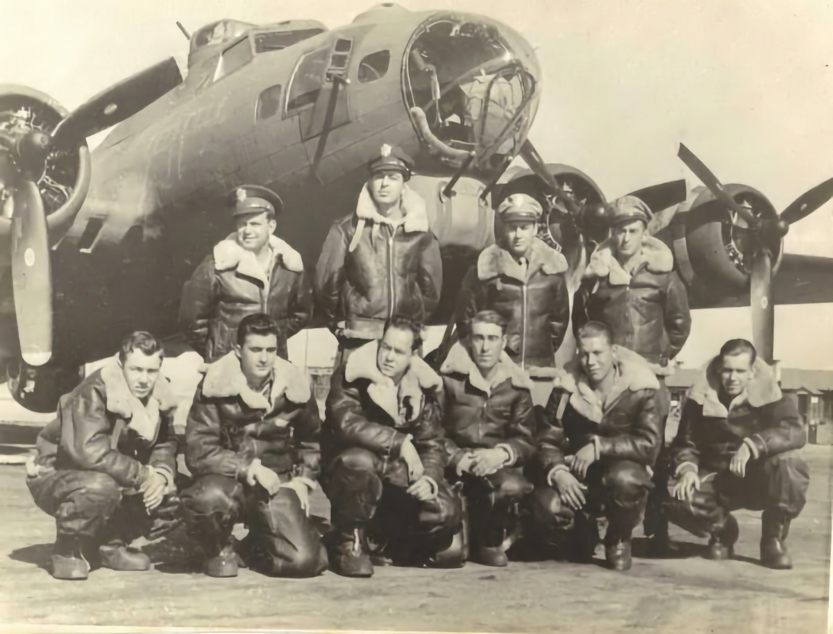 The crew of B-17G Penny's Thunderhead (IW-B 42-31098). Standing (left to right) are 2nd Lt Richard H. Kaufmann (O-802121), pilot; 2nd Lt Frederick Brownell Robinson (O-684566), co-pilot; 2nd Lt Robert Grover Fitzgerald (O-678459), bombardier; 2nd Lt John Barrett (O-683892), navigator; and in front row (left to right) are SSgt Forrest Ray Cope (35680078), ball gunner; SSgt Howard Alexander Shaw (33253277), top turret; SSgt Donald Hall Carlson (39329973) radio operator; SSgt Tage Regnar Nielsen (37434765) left waist gunner; SSgt Henry Leonard Bargfrede (37228695) right waist gunner; and SSgt Edward Warren Masterman (39196860), tail gunner.